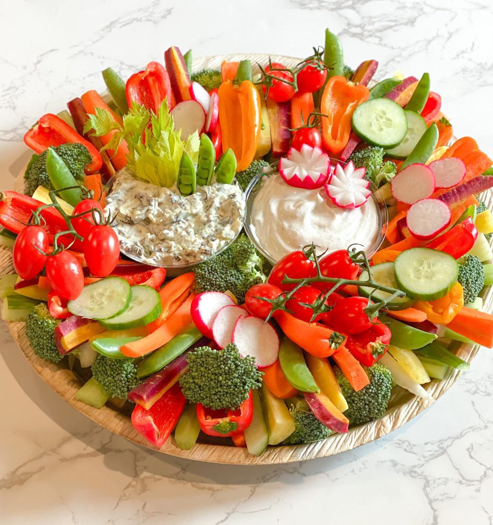 colorful crudites platter with veggies and dip