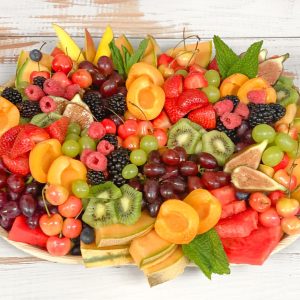 fruit board filled with mixed fruits