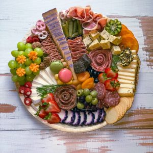 overhead view of medium custom charcuterie board by 2 Board Sisters